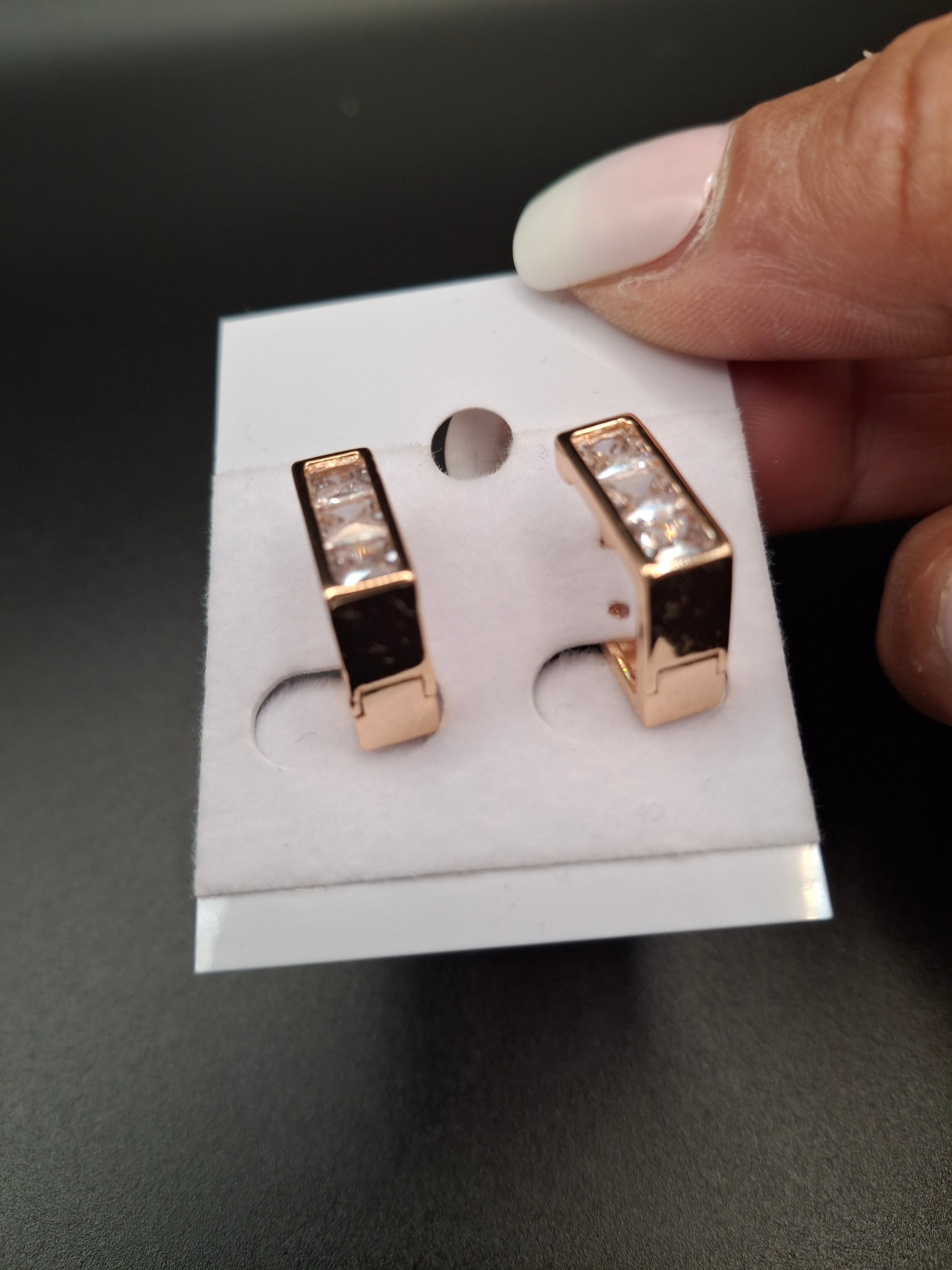 Rose gold diamond accent earrings