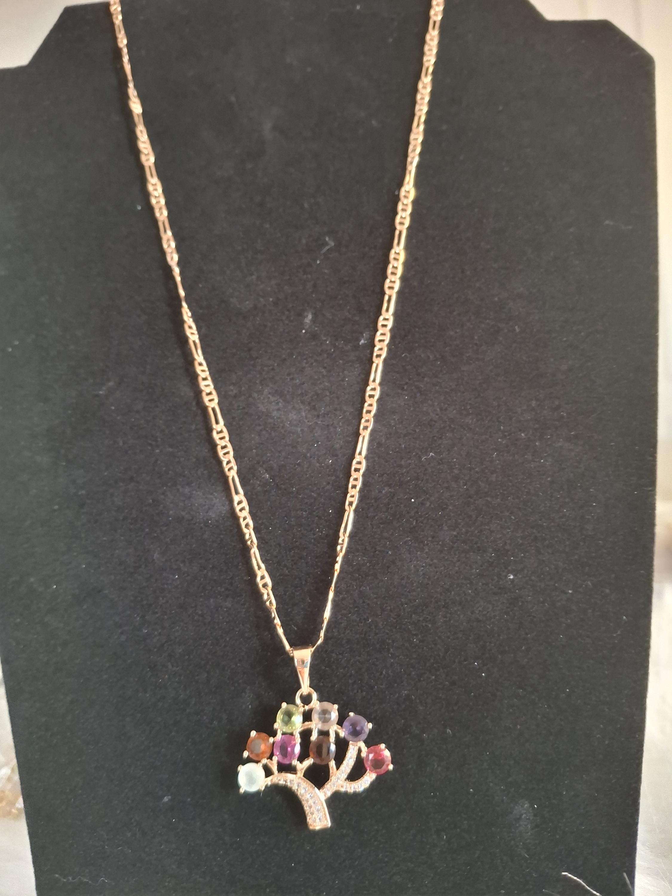 Life tree necklace with diamonds and color stones