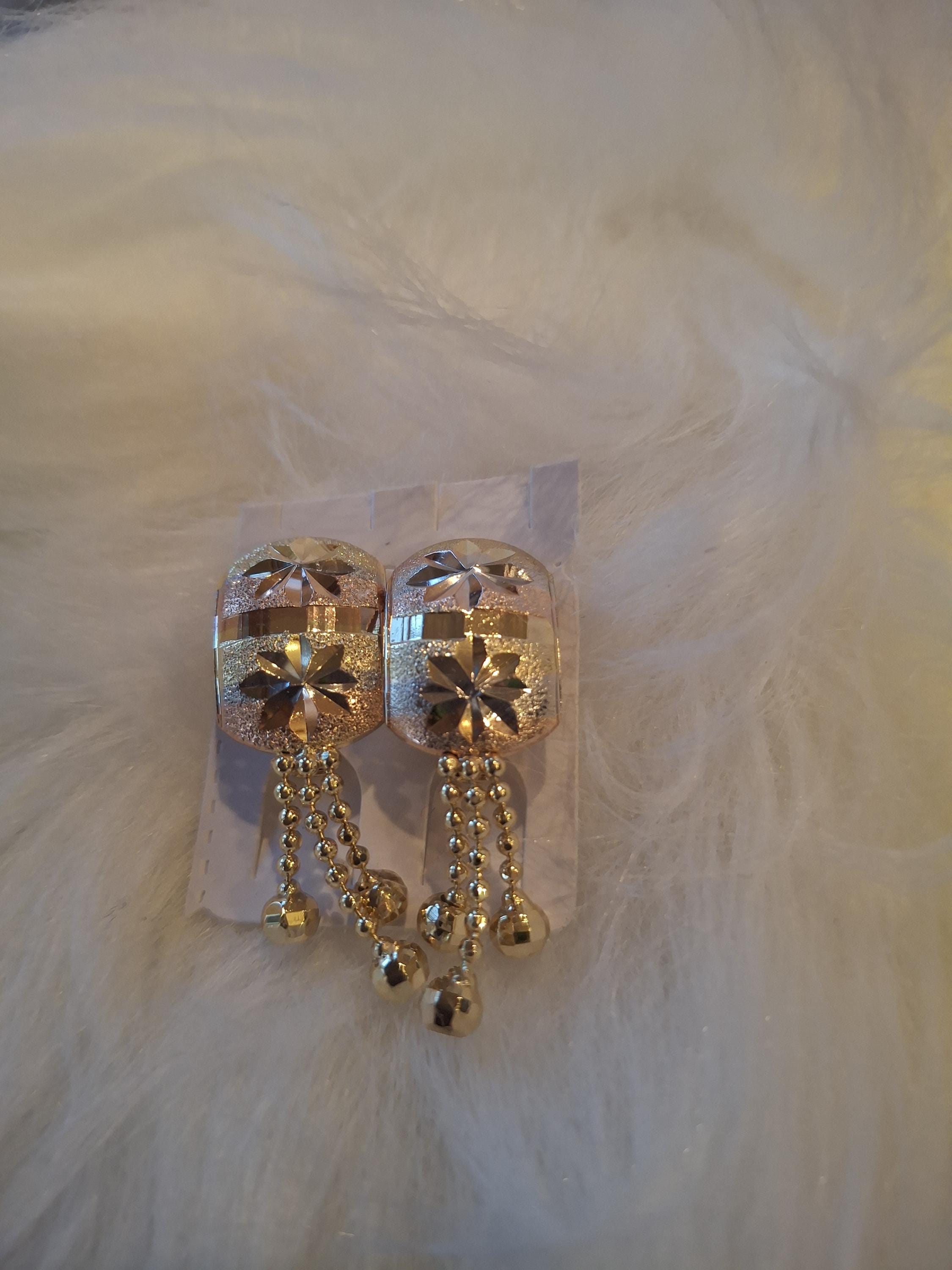 Gold laminated teardrop earrings