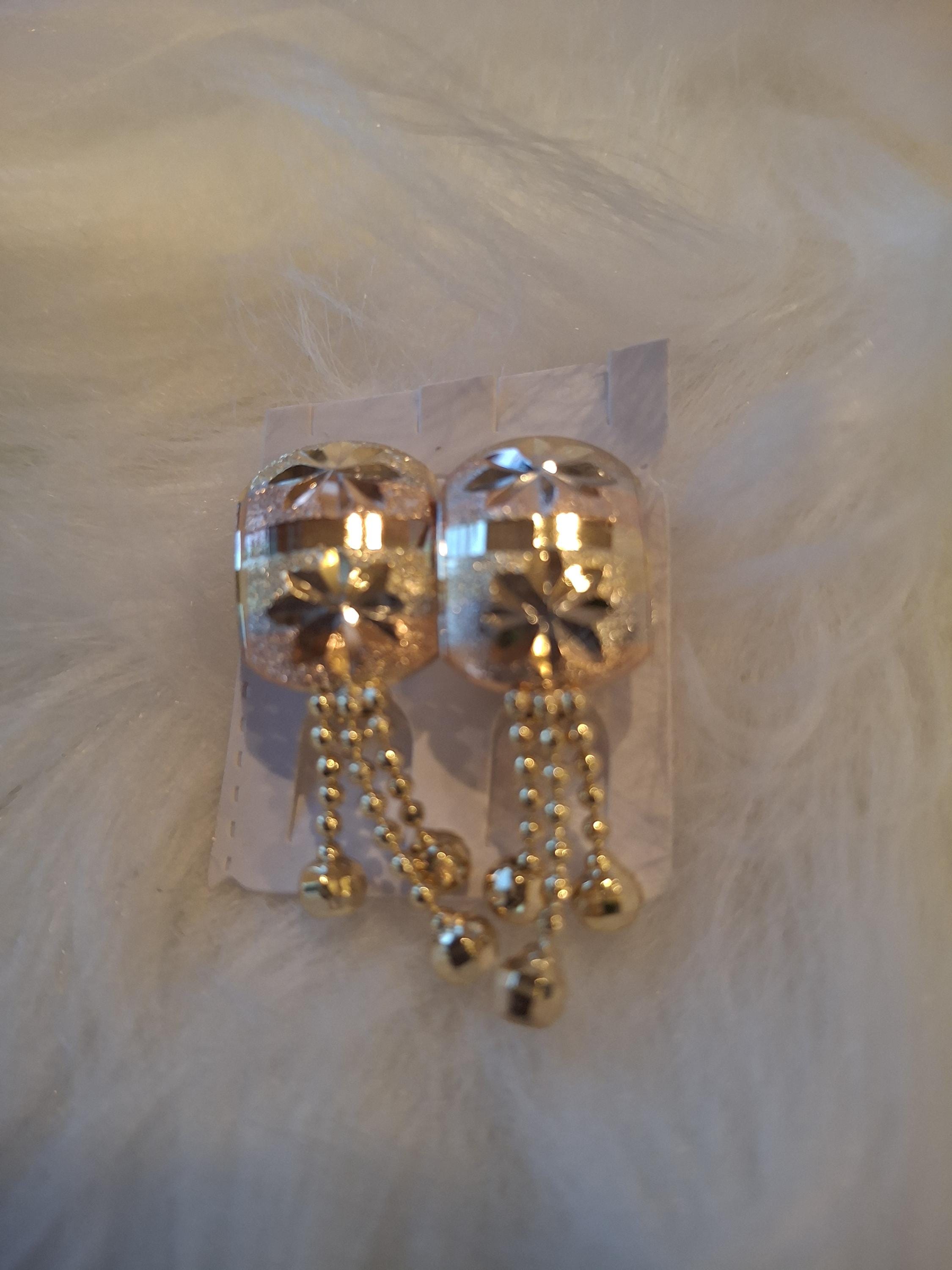 Gold laminated teardrop earrings