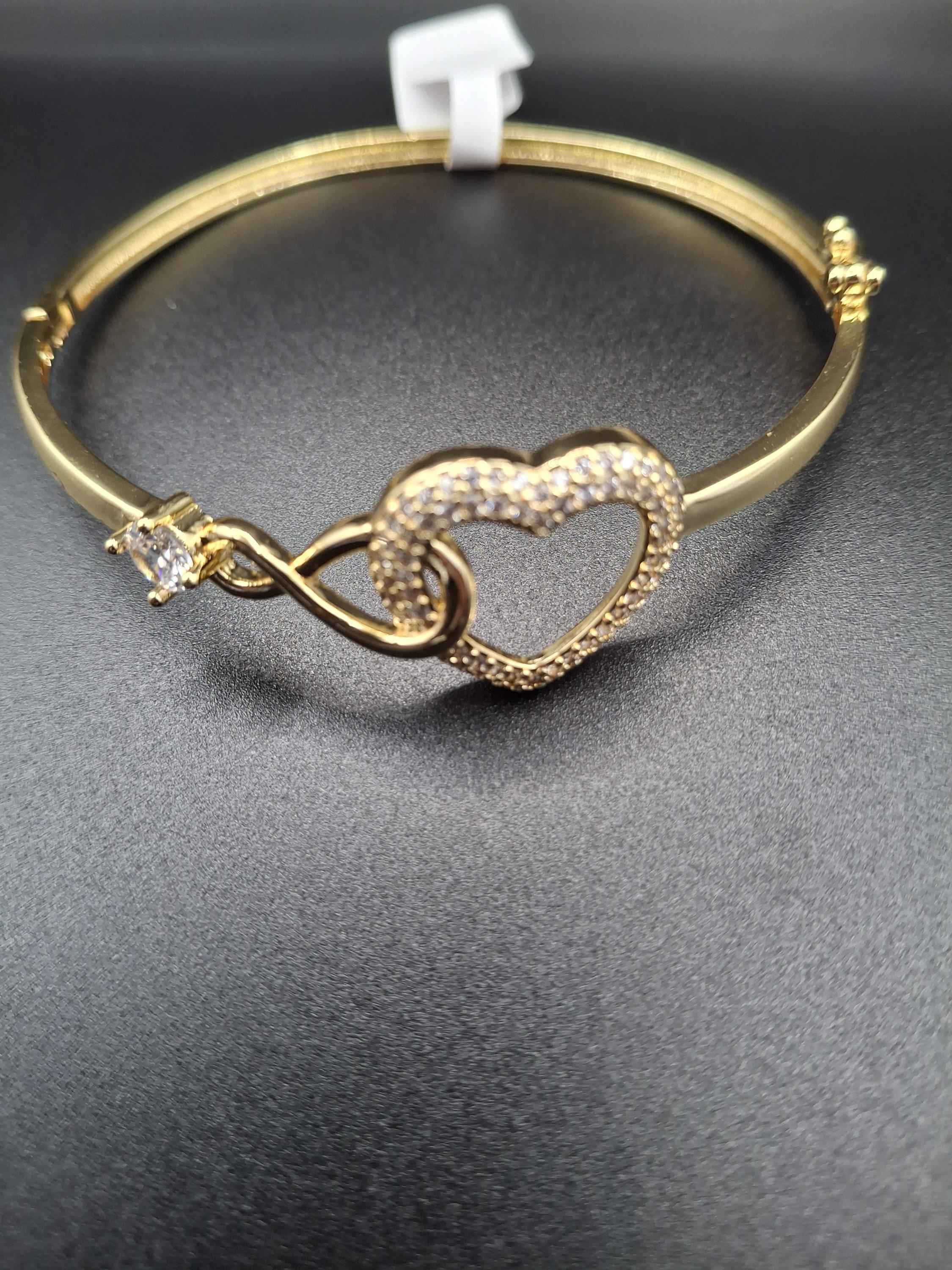 Gold heart bangle