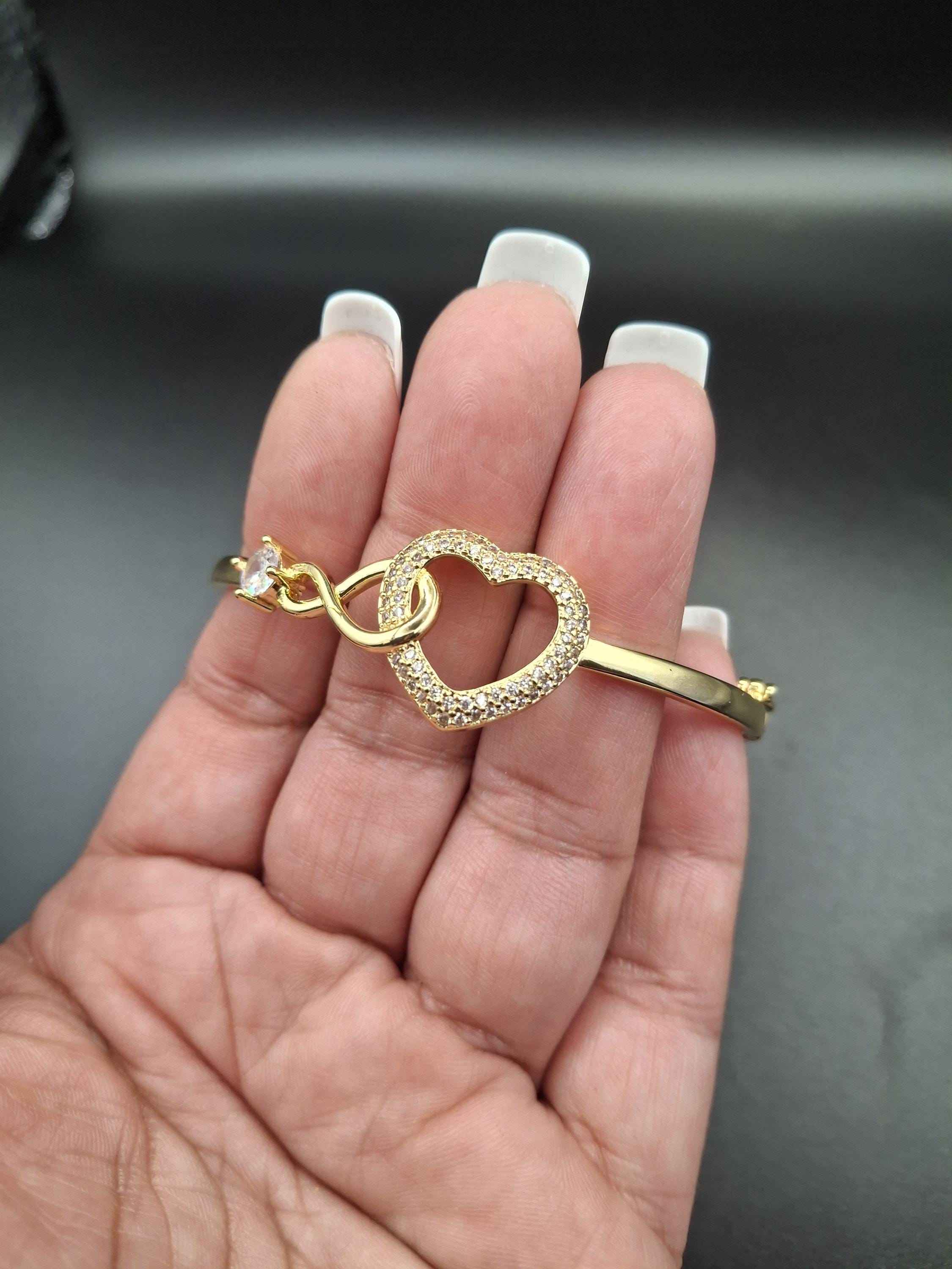 Gold heart bangle