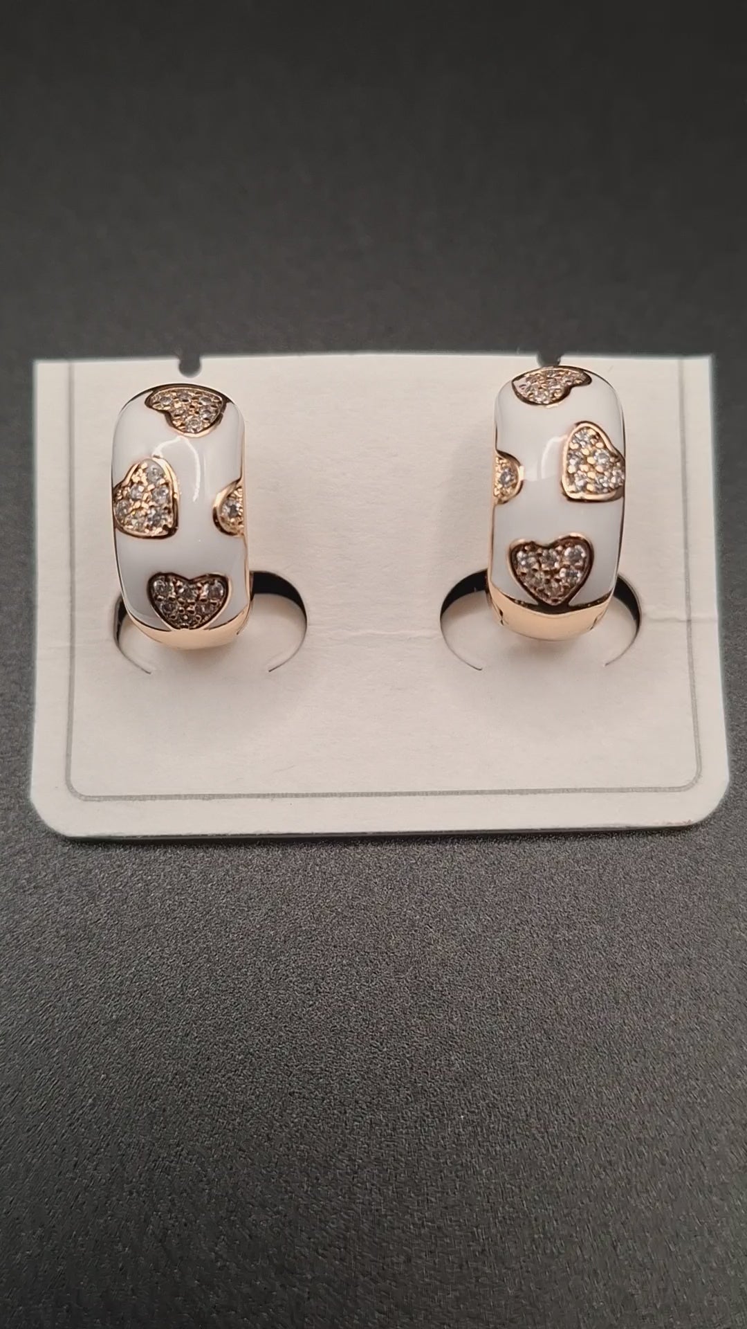 White cowy rose gold earrings