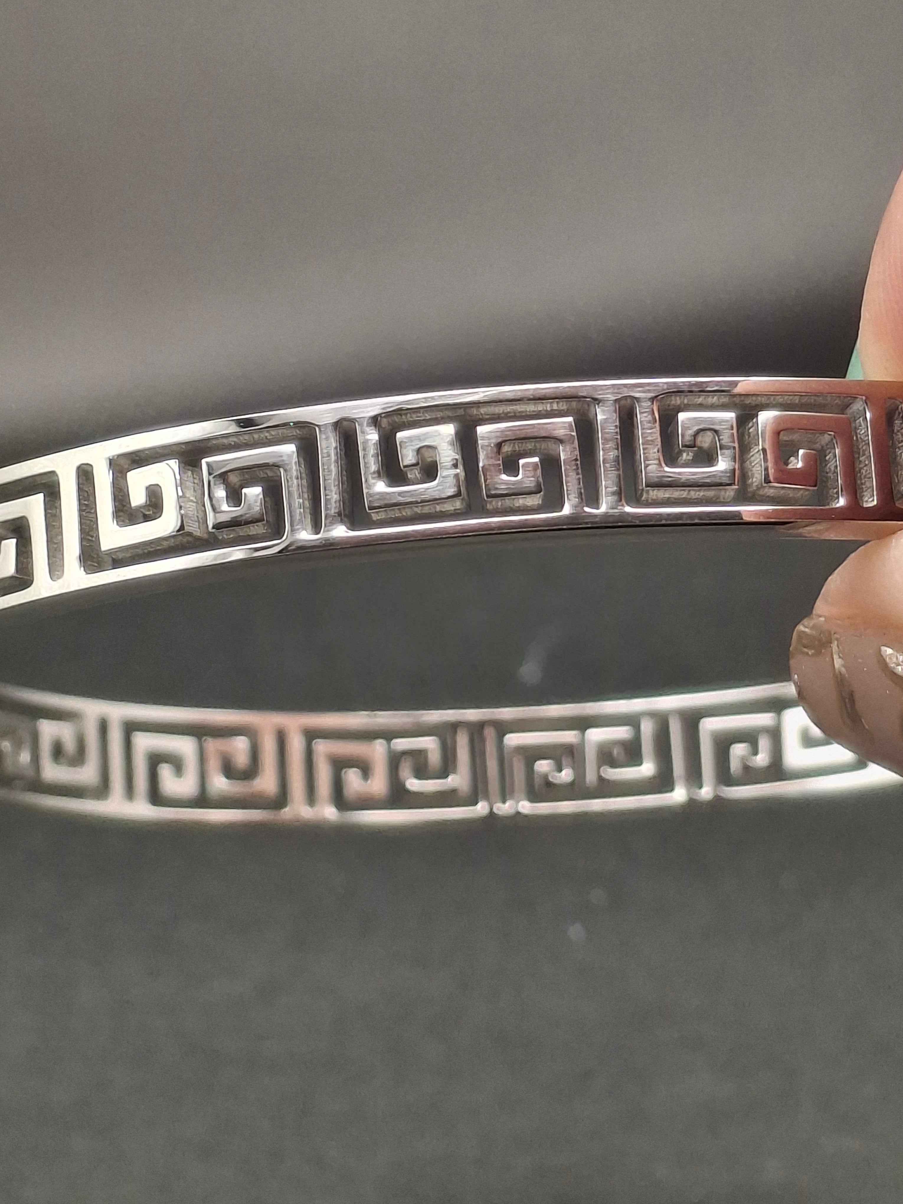 Silver versa stainless bangle