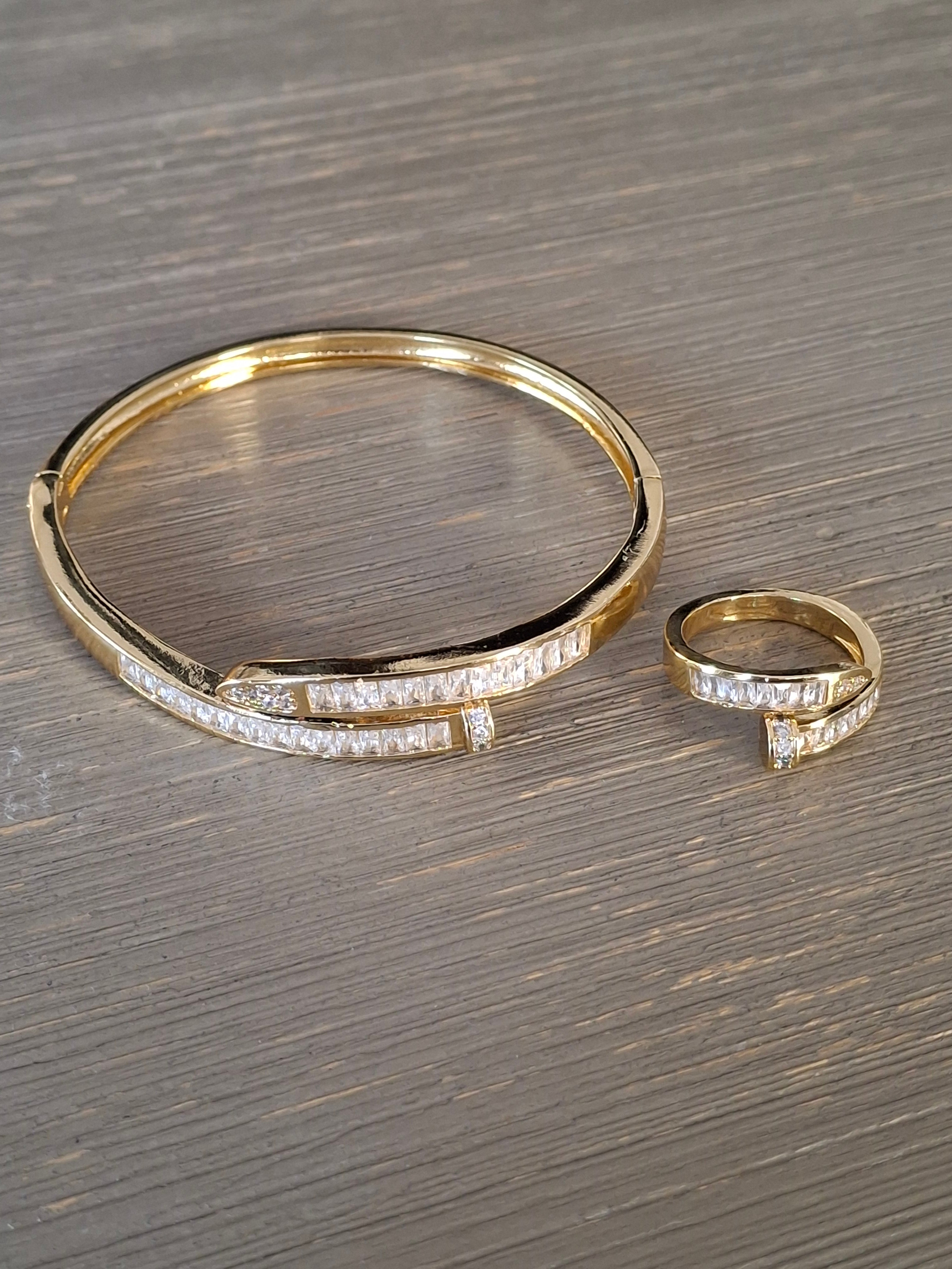 Bracelet and ring set, clavo
